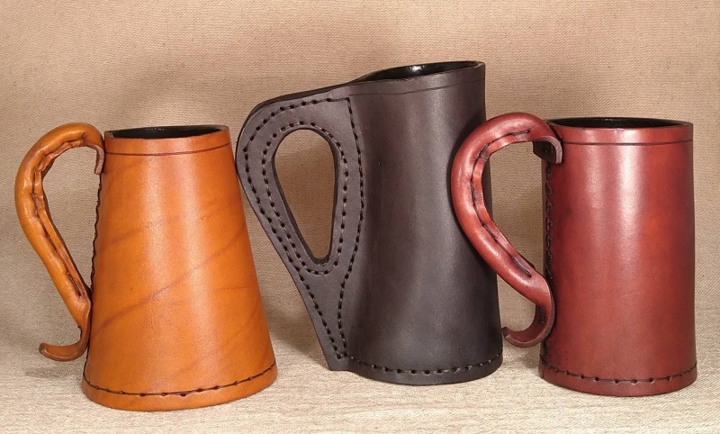 Examples of a Leather Tudor Tankard an Early Medieval Jack and a Late Medieval Jack. All handmade in the UK