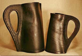 Leather bombards, similar to pitchers handmade by Hidebound. Two- & four-pint versions.
