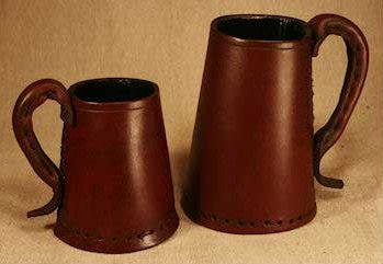 Half pint & One pint full grain leather brown Tudor tankards pictured together